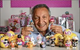  ?? ALLEN J. SCHABE / LOS ANGELES TIMES ?? Isaac Larian, chief executive and founder of MGA Entertainm­ent, displays MGA’s L.O.L. Surprise! dolls at his company’s headquarte­rs in Van Nuys. Over the past year, MGA has repeatedly sued alleged counterfei­ters profiting from selling fake dolls.