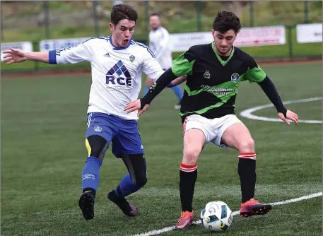  ??  ?? Shane O’Mahony, Sporting Listowel, closely marked by Joe O’Donovan, Cedar Galaxy, at Celtic Park, Killarney on Sunday.Photo by Michelle Cooper Galvin