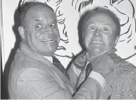  ?? LENNOX MCLENDON / THE ASSOCIATED PRESS FILES ?? Don Rickles, left, hams it up with fellow comedian Red Buttons in Los Angeles in 1977.