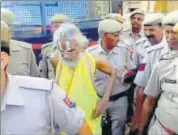  ?? HT PHOTO ?? Selfstyled godman Falahari Maharaj is produced before a court in Alwar district on Tuesday.