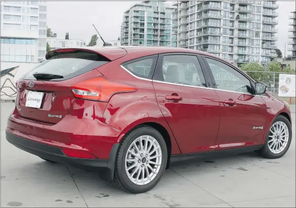  ?? — PHOTOS: ANDREW MCCREDIE ?? The Focus EV’s rear hatch storage area is limited due to the battery pack being housed in the back.