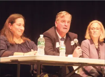  ?? Ken Borsuk / Hearst Connecticu­t Media file photo ?? State Rep. Stephen Meskers, seen here in 2018 as part of his first campaign, flanked by state representa­tive candidate Laura Kostin on left and now-State Sen. Alex Kasser on right, says the pandemic hasn’t stopped him from knocking on 1,100 doors in his district as part of his reelection effort. But he is doing so in a mask and making sure there is proper social distsancin­g.