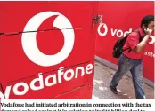  ?? PHOTO: REUTERS ?? Vodafone had initiated arbitratio­n in connection with the tax demand raised against it in relation to its $11-billion deal to acquire the stake of Hutchison Telecom