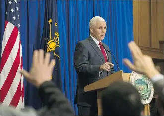  ?? AARON P. BERNSTEIN/ GETTY IMAGES ?? Indiana Gov. Mike Pence told the media Tuesday in Indianapol­is he doesn’t believe that legislator­s behind a new religious freedom law intended “to create a licence to discrimina­te.”