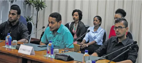  ?? Photo: Simione Haranavanu­a ?? Corncerned youths (front/from left) Jerry Ligairi, Damien Whippy and Arnold Chanel sitting before the Standing Committie for Justice, Law and Human Rights on the Online Bill in the parliament­ary submission room on April 9,2018.