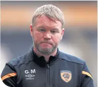  ??  ?? Hull manager Grant McCann looks dejected