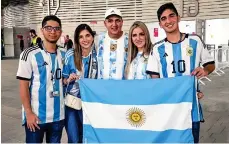  ?? — PHOTOS BY RITURAJ BORKAKOTY ?? (From left) Jose, Georgette, Roberto, Elena and Roberto Jr are all smiles after Argentina’s impressive 2-0 victory over Mexico.