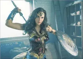  ?? Clay Enos Warner Bros. ?? WONDER WOMAN (Gal Gadot) can best foes, but she can’t best Hollywood.