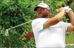  ?? NICK NICHOLAS PHOTO ?? Scott Berliner follows flight of tee shot on 10th hole during Emerson Resort &amp; Spa Woodstock Open at Woodstock Golf Club.