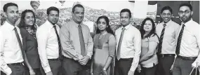  ??  ?? Hemas Travels Director Riza Ahamat (fourth from left) with the team at Jaffna office