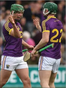  ??  ?? Star forward Conor McDonald celebrates Sunday’s super win over Kilkenny with late substitute Harry Kehoe.