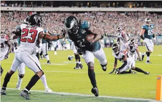  ?? GETTY IMAGES FILE PHOTO ?? Jay Ajayi of the Eagles rushes for an 11-yard touchdown against the Atlanta Falcons in Philadelph­ia on Sept. 6.