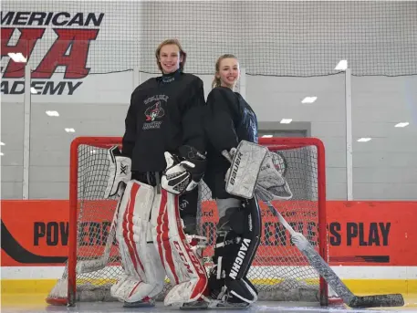  ?? FAITH NINIVAGGI / HERALD STAFF ?? LAST LINE OF DEFENSE: Wellesley goaltender­s Drew Hubbard (left) and Liddy Schulz have been calming influences for the Raiders.