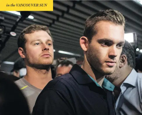  ?? CHRIS MCGRATH / GETTY IMAGES ?? U.S Olympic swimmers Gunnar Bentz and Jack Conger leave police headquarte­rs at Rio de Janeiro’s Galeo Internatio­nal Airport on Thursday. The swimmers were removed from their flight departing for the United States by Brazilian authoritie­s.