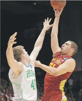  ?? | AL BEHRMAN~AP ?? Iowa State forward Georges Niang, who had 19 points, shoots over Notre Dame forward Jack Cooley in the first half.