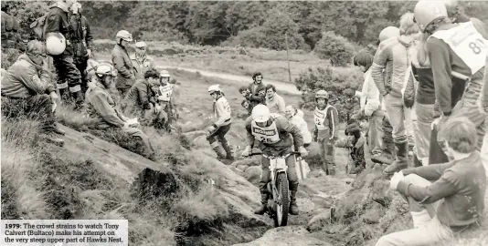  ??  ?? 1979: The crowd strains to watch Tony Calvert (Bultaco) make his attempt on the very steep upper part of Hawks Nest.