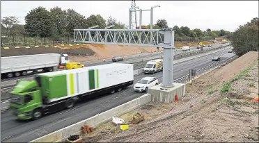  ?? Picture: Andy Jones ?? Work progressin­g on the M20 smart motorway scheme, near Larkfield