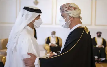  ?? Abdulla Al Junaibi / Ministry of Presidenti­al Affairs ?? Sheikh Mansour bin Zayed, Deputy Prime Minister and Minister of Presidenti­al Affairs, receives condolence­s from a delagate from Oman