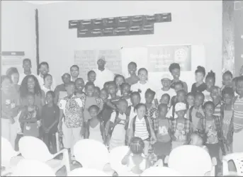  ??  ?? Children from in and around the Sophia area who received back-to-school hampers courtesy of the Rotaract Club of Georgetown.