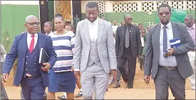  ?? (File Pic) ?? Matsapha Government Primary School Head teacher, Thulani Dlamini (L) with Minister of Sports, Culture and Youth Affairs Bongani Nzima (C) and Manzini REO Sizwe Kunene during the school tour.