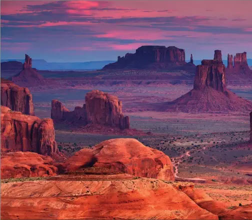  ??  ?? Sunrise near Monument Valley, Arizona, a view immortalis­ed in countless cowboy films