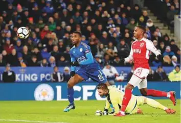  ?? Reuters ?? Leicester City’s Kelechi Iheanacho (left) scores their second goal after a VAR (Video Assistant Referee) decision confirmed the strike on Tuesday.