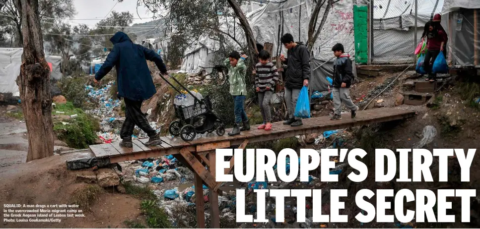  ??  ?? SQUALID: A man drags a cart with water in the overcrowde­d Moria migrant camp on the Greek Aegean island of Lesbos last week. Photo: Louisa Gouliamaki/Getty