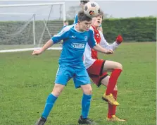  ?? ?? Heslerton Under-15s (blue) in action against Copmanthor­pe