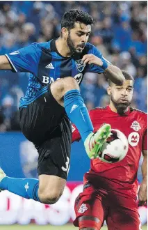  ?? PAUL CHIASSON/THE CANADIAN PRESS FILES ?? Saturday is the second MLS regular-season meeting between the Impact and Toronto FC.