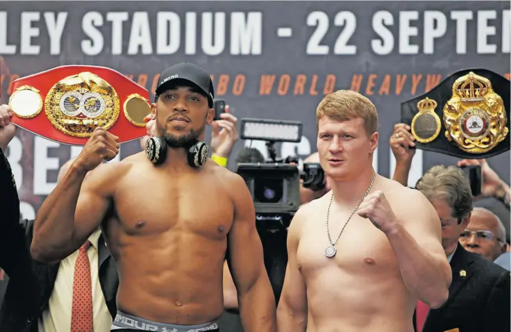  ?? Photo: Zimbio ?? Anthony Joshua and Alexander Povetkin pose for the cameras during the weigh-in on September 21, 2018 in London, England.