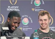  ?? File, Richard Vogel / AP ?? Georgia quarterbac­k Jake Fromm (right) laughs with teammate Sony Michel during a news conference in Los Angeles on Thursday. The Bulldogs will face Oklahoma on Monday in the Rose Bowl.