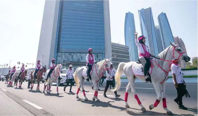  ??  ?? ↑
The 10th annual Pink Caravan Ride concludes its 10-day pan-uae awareness campaign in Abu Dhabi on Friday.