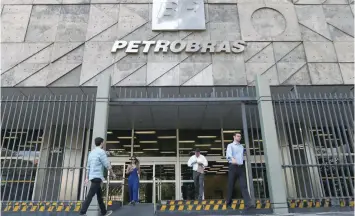  ?? — Reuters ?? Brazil’s state-run Petrobras oil company headquarte­rs is pictured in Rio de Janeiro, Brazil.