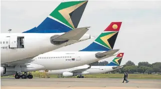 ?? /Bloomberg ?? Knock-on effect: Placing SAA under business rescue might create the negative impression that the country cannot pay back its debts.