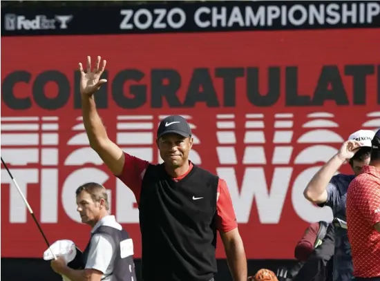  ?? AP file ?? GOOD VIBES: Tiger Woods celebrates after winning the Zozo Championsh­ip at the Accordia Golf Narashino Country Club in Inzai, Japan, on Oct. 28, 2019. The Zozo Championsh­ip will be played this week in California on a course where Woods has had success.