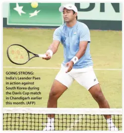  ??  ?? GOING STRONG: India's Leander Paes in action against South Korea during the Davis Cup match in Chandigarh earlier this month. (AFP)