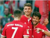  ?? Reuters ?? Bayern Munich’s Juan Bernat celebrates scoring their first goal with Franck Ribery (left) and Thomas Muller (centre). —