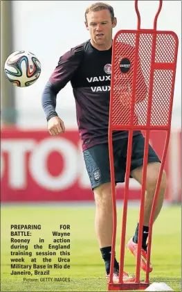  ?? Picture: GETTY IMAGES ?? PREPARING FOR BATTLE: Wayne Rooney in action during the England training session this week at the Urca Military Base in Rio de Janeiro, Brazil