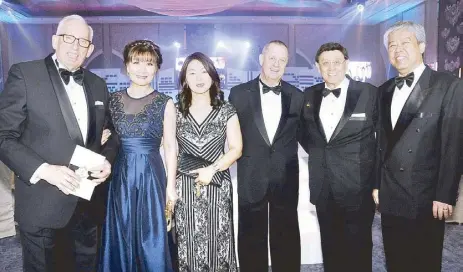  ??  ?? (From left) Bonifacio Landmark Realty and Developmen­t Corp. director Hans Hauri and wife Bo, Sunny Pirodon and husband, InterConti­nental Hotels Group regional GM for Philippine­s and Korea Christian Pirodon, your columnist and Dr. Elton See Tan.