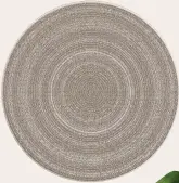  ?? ?? Alfresco round rug, €65 from Marks & Spencer