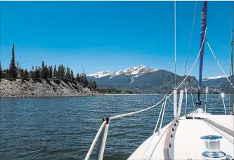  ?? RACHEL WALKER FOR THE WASHINGTON POST ?? Frisco’s Lake Dillon, a reservoir in the Colorado Rockies, is a popular spot for high-altitude sailing.