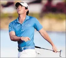  ?? Lynne Sladky/associated Press ?? Rory Mcilroy held on to win the Honda Classic on Sunday and will be ranked No. 1 when the world golf rankings come out today.