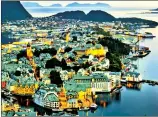  ??  ?? Kirkenes has a population of 8,200 with a total regional population of 10,200. Below, Kirkenes borders Russia, Finland and the hydrocarbo­n-rich Barents Sea which promises wealth, jobs and an Arctic alternativ­e to the Suez Canal as a global trade route...