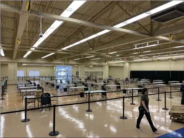  ?? PHOTO COURTESY MONTGOMERY COUNTY COMMISSION­ERS ?? Montgomery County officials prepare to open a third COVID-19vaccinat­ion clinic, scheduled to open on Friday at the Parkside Shopping Center, in the former Petco location, in Willow Grove. Appointmen­ts are required for vaccinatio­ns.