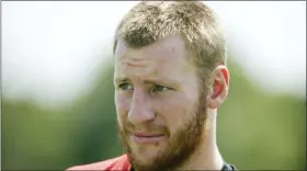  ?? MATT ROURKE — THE ASSOCIATED PRESS ?? Philadelph­ia Eagles quarterbac­k Carson Wentz walks off the field at the NFL football team’s training camp in Philadelph­ia.