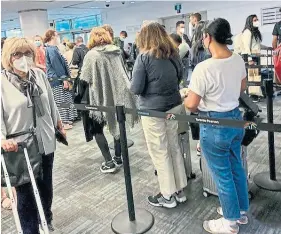  ?? TORONTO STAR PHOTO ?? Travellers arriving at Pearson airport over the May long weekend line up at customs. Airlines have expressed concern about the ongoing delays as interest in travel continues to ramp up.