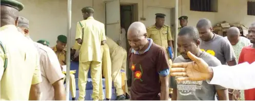  ?? Photo: Romoke W. Ahmad ?? Some suspected armed robbers that attacked banks at Offa in Kwara State, during their appearance at the Kwara State High Court in Ilorin yesterday