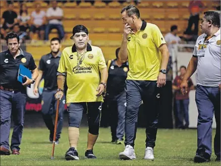  ?? Gary Coronado Los Angeles Times ?? DIEGO MARADONA, once considered the world’s greatest soccer player as a member of Argentina’s national team, now needs a cane to walk across the Estadio Banorte pitch where he coaches the Dorados of Sinaloa, a second-division team in Culiacan, Mexico.