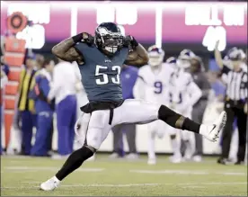  ?? AP photo ?? The Eagles’ Nigel Bradham celebrates after sacking Giants quarterbac­k Eli Manning during the second half Thursday.