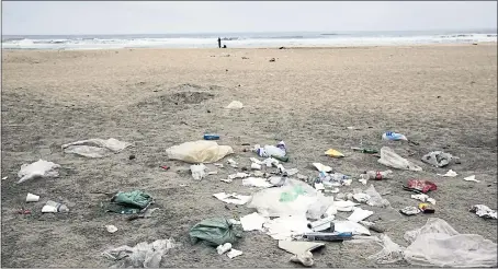  ?? STAFF FILE PHOTO ?? Tunitas Creek Beach still shows piles of trash left behind by 4th of July partygoers on July 6, 2016, near Half Moon Bay.